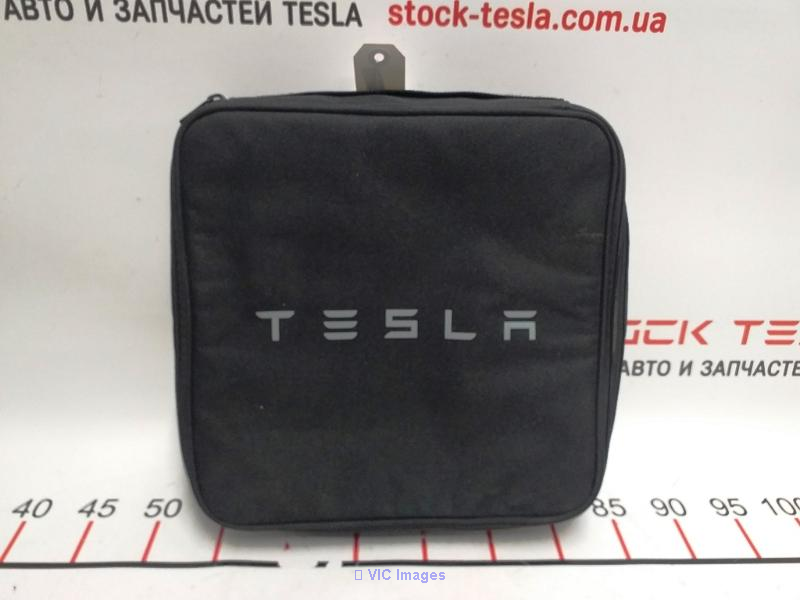 The original TESLA charger bag has the article 1126118-00-B